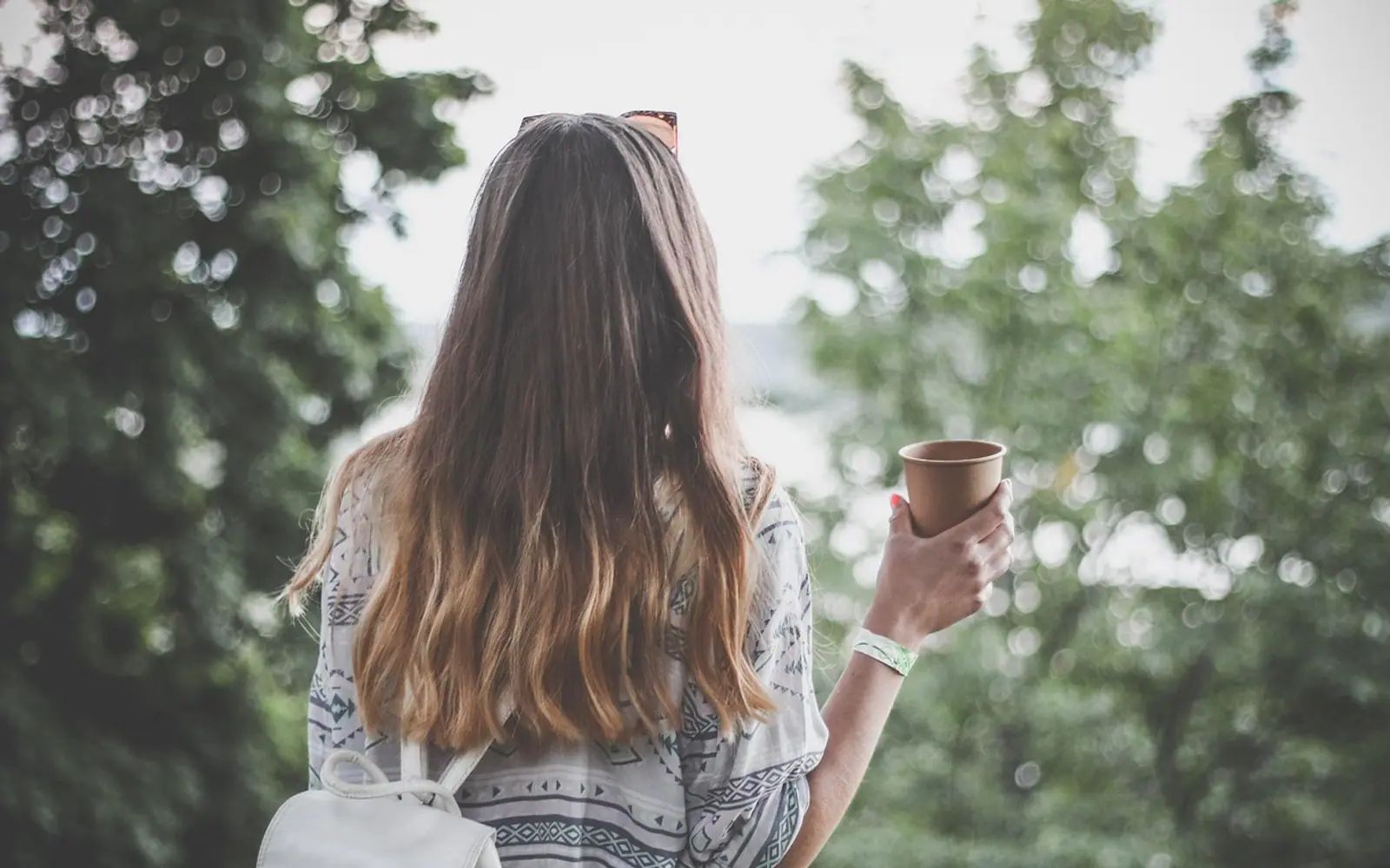 Adult, back view and coffee