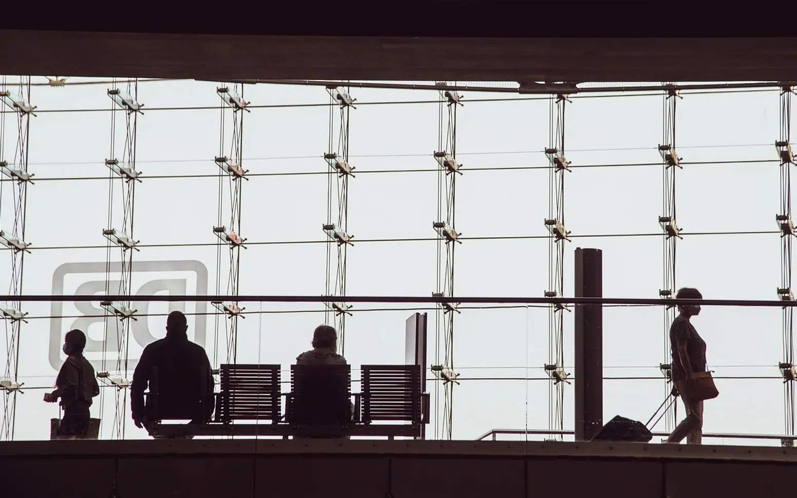 Silhouettes, people and bank